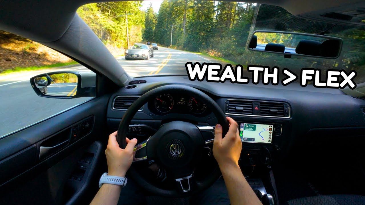 Older Volkswagen Jetta with title overlay about financing your first car