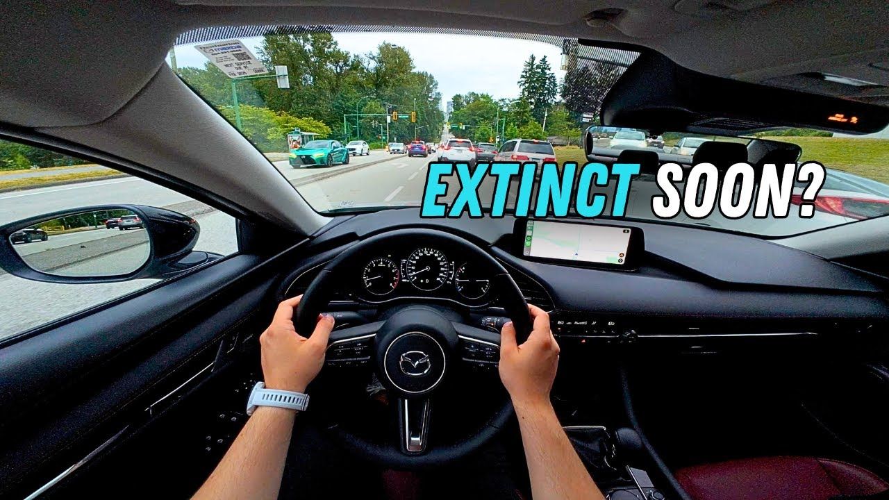 A small fun-to-drive car on the road